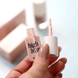 Liquid Highlighter Luminescent Complexion Enhancer.